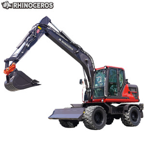 Radbagger mit Holzgreifer